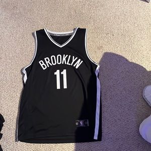 Perfect condition, nike kyrie irving, nets jersey.